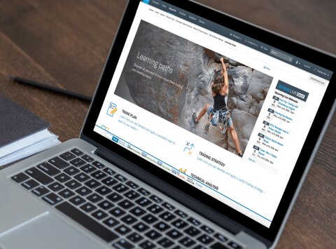 A laptop open to the Learning Center webpage